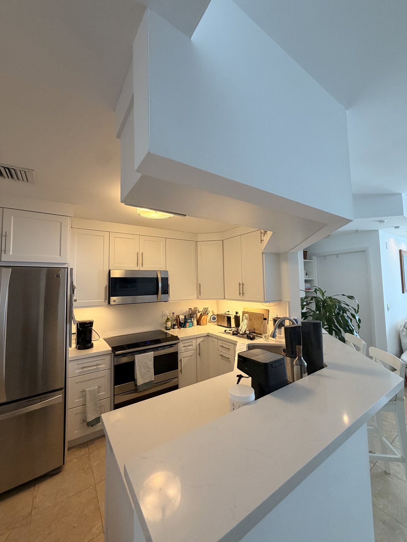 Kitchen furnished with everyday items in place